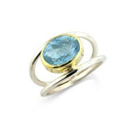 AQUAMARINE RING SET IN 18ct GOLD ON SILVER SPLIT BAND RING