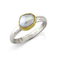 OVAL PEARL SILVER RING SET IN 18CT GOLD