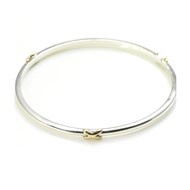 SILVER BANGLE WITH THREE 9CT GOLD KISSES