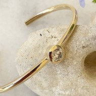 GOLD TORQ BANGLE WITH SOLITAIRE DIAMOND