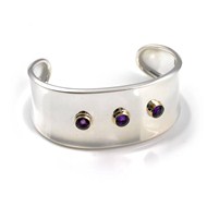 SILVER CUFF WITH AMETHYST IN GOLD